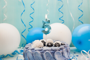 Happy fifth birthday card with navy cake and number five candle with blue and white  decoration