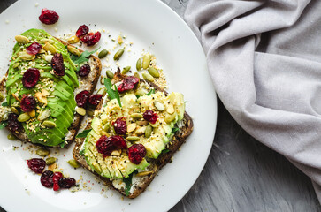 Healthy avocado toasts for breakfast or lunch with rye bread