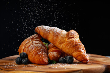 croissant on wooden table