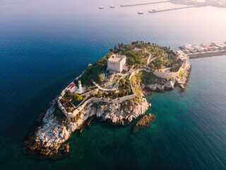 Aerial wide shot of castle tower of Pigeon Island - Guvercinada in Kusadasi Turkey in sunrise time