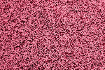 Abstract textured pattern small pieces of broken glass toned into Viva Magenta color. Inspired by new Pantone color of the year 2023. Damaged window glass background.