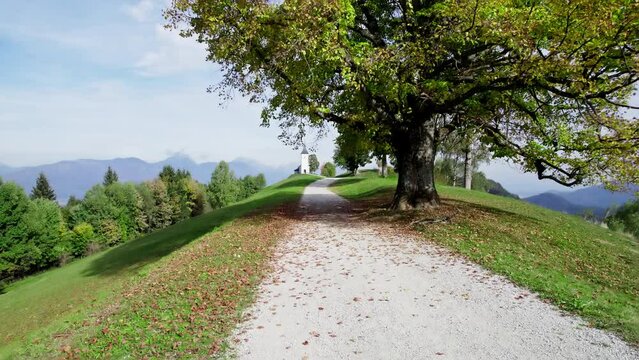 The Church of St. Primož and Felicijan drone 4K dog footage, autumn mood, Jamnik, Slovenia