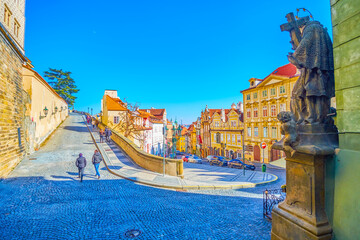 The sculpture of the Jan Nepomuck on the corner at Ke Hradu descent leading to Prague Castle, Czechia