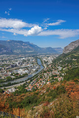 The scenic view of River Isere and European alps in Grenoble, France.