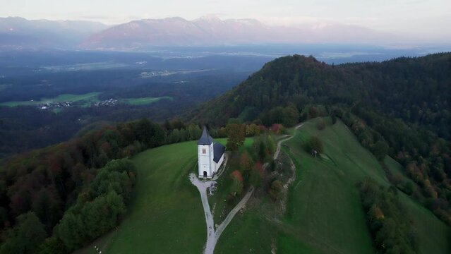 The Church of St. Primož and Felicijan drone 4K dog footage, autumn mood, Jamnik, Slovenia