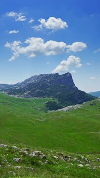 Landscape with mountains in the park Durmitor, Montenegro, timelapse. Vertical video