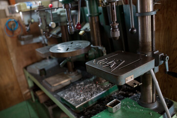 Part machining with drilling machine