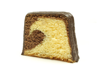 Slice of chocolate coated marble cake isolated on white background