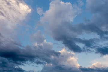 Section of the sky with cumulus and storm clouds