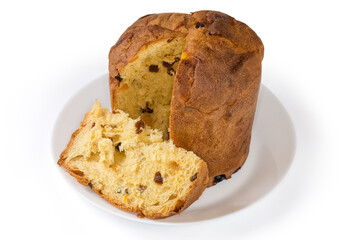 Sweet bread with candied fruit and raisins cut on dish