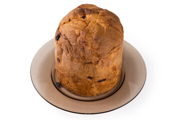 Sweet bread with candied fruit and raisins on glass dish