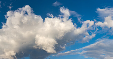 Section of the sky with cumulus and storm clouds