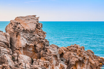 Fototapeta na wymiar Rocks sculpted by the sea