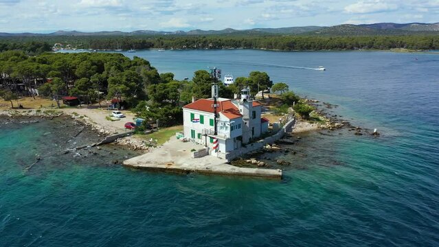 Jadrija lighthouse in Sibenik bay entrance aerial view, archipelago of Dalmatia, Croatia. Aerial view of lighthouse in town of Jadrija in Sibenik bay in Croatia, beautiful seascape.