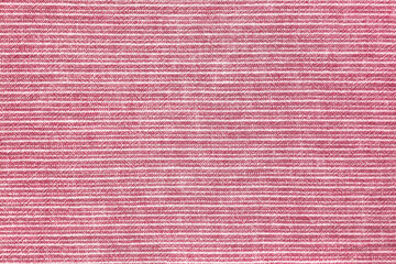 Natural linen texture as background. Cotton fabric with red and white line striped pattern, texture close up, top vies, flat lay. Backdrop, wallpaper. Matereal for clothes, curtain and upholstery