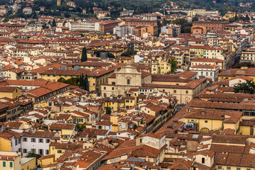Fototapeta na wymiar Florence, Italy. :Scenic view of the city from the height of the Duomo dome. Convent of San Marco in the center