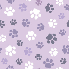 Fototapeta na wymiar Pet paw seamless pattern. Vector illustration with cat or dog paw on purple background. It can be used for wallpapers, wrapping, cards, patterns for clothes and other.
