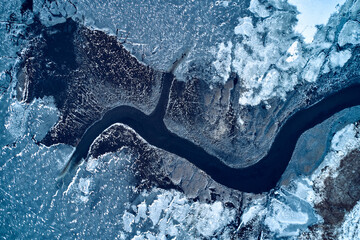 aerial view from icy river in winter