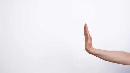 A hand on a white background pushes out text or advertising. Copy space. - Powered by Adobe