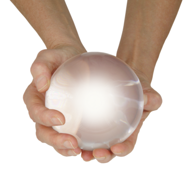 Crystal Gazing Clairvoyant female fortune teller with large crystal ball held in cupped hands with a soft white center transparent png file
