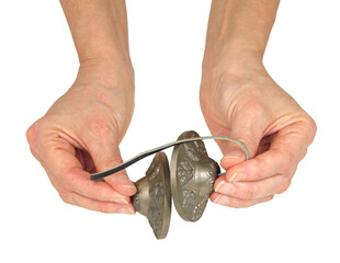 Female hands playing a pair of Ting Sha percussion bells transparent png file
