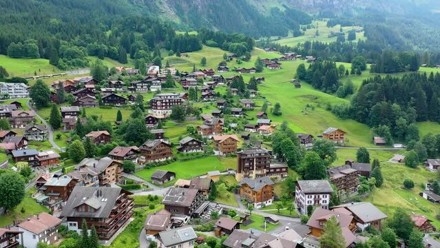 Townscape of village of Wengen on the edge of Lauterbrunnen Valley. Traditional local houses in Wengen village in the Interlaken district in the Bern canton of Switzerland.
