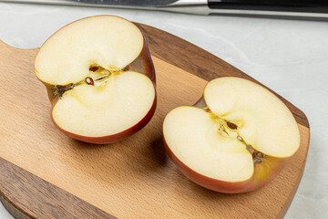 Empty wooden cutting board on the kitchen table