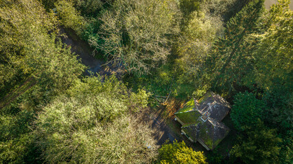 Aerial view of lonely small house in a middle of forest, west sussex, uk