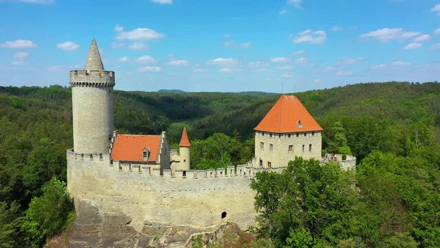 Aerial view of medieval castle Kokorin nearby Prague in Czechia. Central Europe. Medieval gothic castle Kokorin, Kokorinsko protected landscape area in Czech Republic. Medieval gothic castle Kokorin.