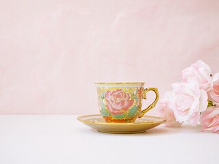 Antique cup of tea with pink rose on pink background ,Valentine's day romantic ,Mother's day ,pretty background or wallpaper ,Chinese traditional ,wedding card design ,coffee cup ,lovely love card 