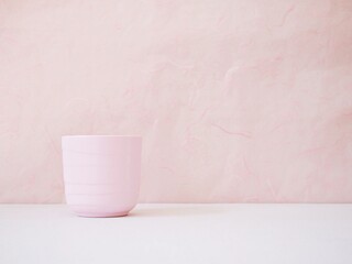 Coffee cup ,Pink Tea cup on white table Pink background for lettering writing message for Mother's day ,Valentine's ,Greeting card ,Celebrate ,empty wall Copy space Romantic love festive card