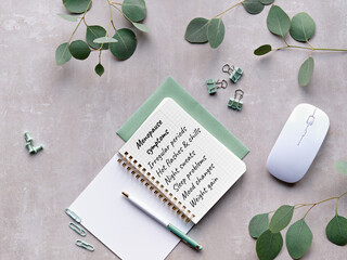 Menopause symptoms handwritten in notebook. Menopause awareness, management concept image....