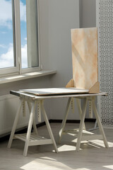 Double-sided backdrop on table in photo studio