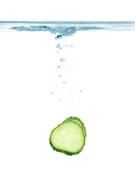 Fresh Cucumber Slice In Water On White Background