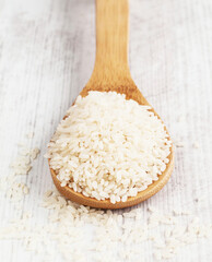 rice in a wooden spoon