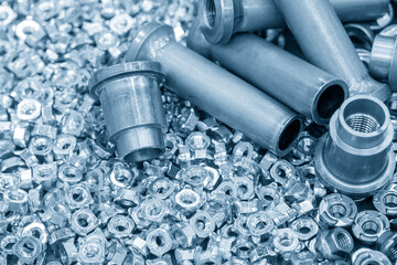 The pile of construction galvanize nuts and metal tube.