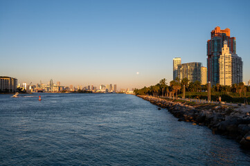 Fototapeta premium Residential towers on South Pointe in Miami Beach, Florida in early morning light on clear cloudless sunny day.