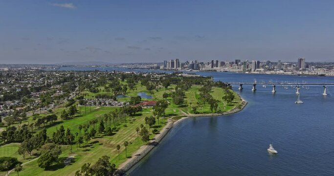 San Diego California Aerial v54 flyover along the bayshore of coronado capturing municipal golf course with downtown cityscape view across the bay - Shot with Mavic 3 Cine - September 2022