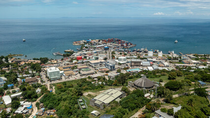 Fototapeta na wymiar Aerial view of the National Parliament grounds looking down to the seaport and wharves.