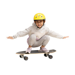 Happy asian little girl playing skateboard wearing a helmet, Full body portrait isolate background  © kromkrathog
