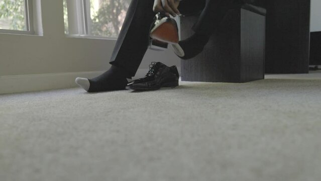 Groom putting on shoes on his wedding day. Getting ready. GRWM. Shot in 4K 60 FPS. To purchase entire event raw at wholesale price email willneatheryyahoo.com.