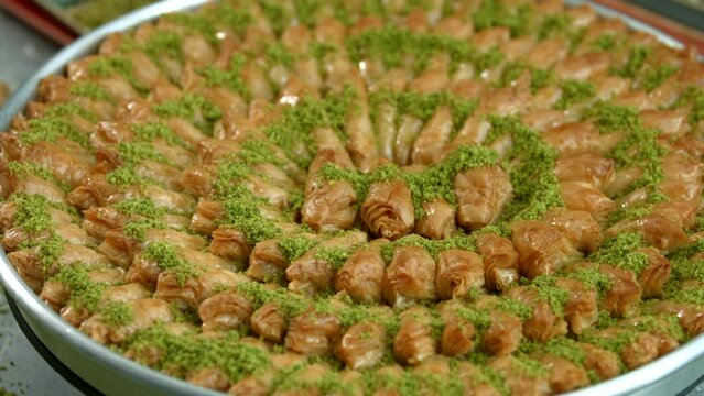 Traditional turkish baklava pistachio pastry. Dilberdudagi, ozel kesim baklava, cikolatali baklava, fistikli baklava, katmer, fistikli kadayif, kattafi, fistik sarma, soguk baklava, midye baklava, cev