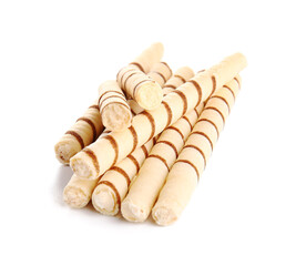 Heap of tasty wafer rolls isolated on white background