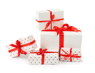Gift boxes with red satin ribbon isolated on white background. Valentine's Day celebration