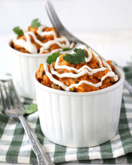 Curry with cream and fork