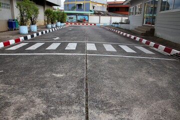 crosswalk pedestrian crossing the road Stop the car for people to cross the road.