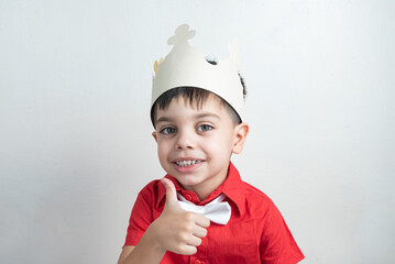 Cute boy with classic clothes - With paper crown