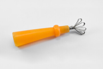 Peeler used for cantaloupe or coconut fruit on an isolated white background