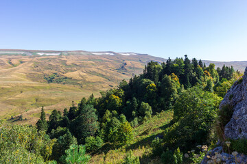 mountainous terrain, autumn walks in the bosom of nature,.strolling and contemplating the riot of colors in nature..