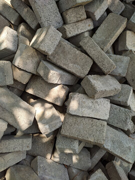 Pile of irregular paving blocks to cover the soil surface. With top angle © Mulad Images